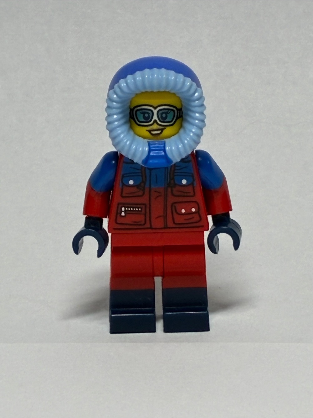 Lego Red and Blue Arctic Minifigure with Light Blue Fur Hood